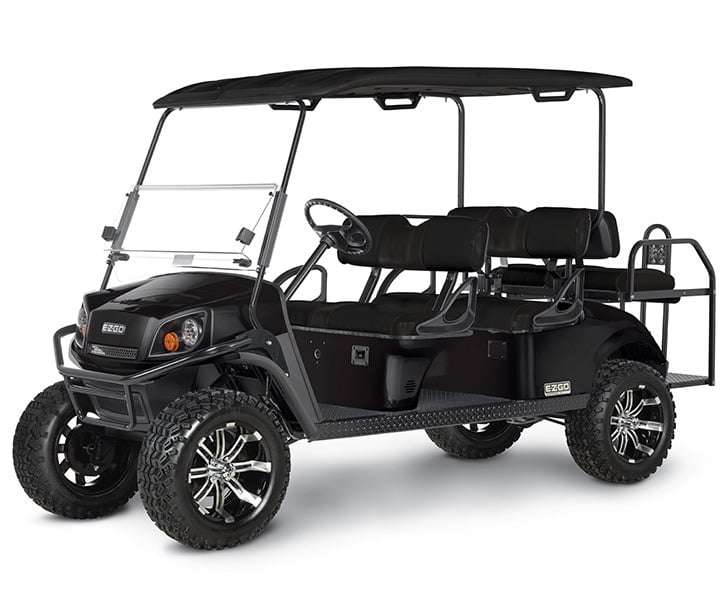 Black six-seat golf cart with large off-road wheels against a white background